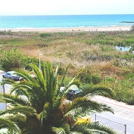 ホテル Moderno Piso Con Vista A La Playa プエブラ・ド・ファルナルス